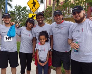 Members of the Alliance Law Firm team in firm shirts at the 4KIDS BiG Cardio event